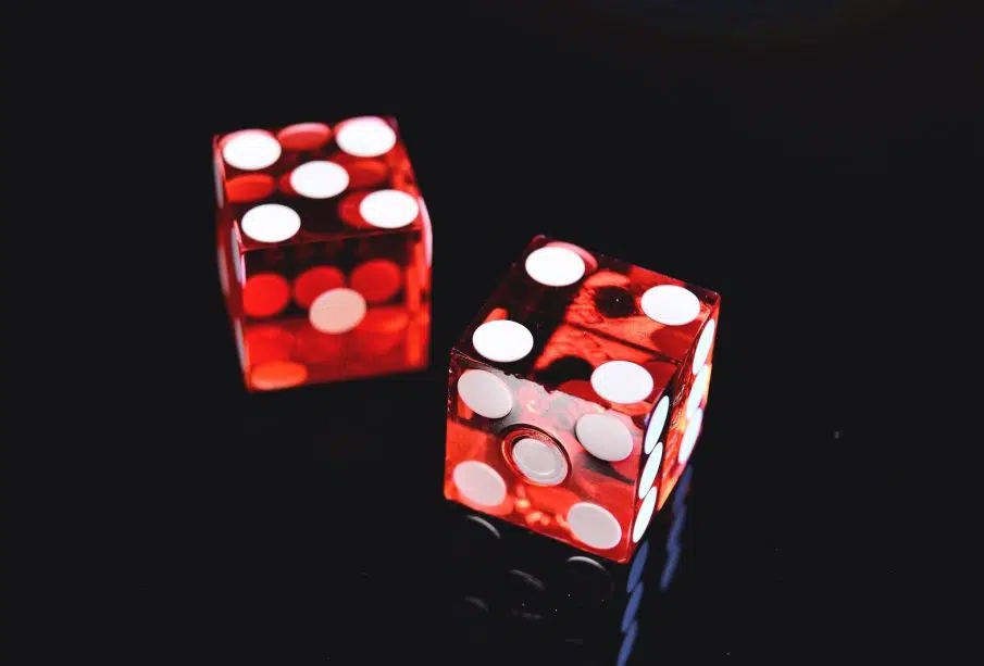 Closeup Photo of Two Red Dices Showing 4 and 5