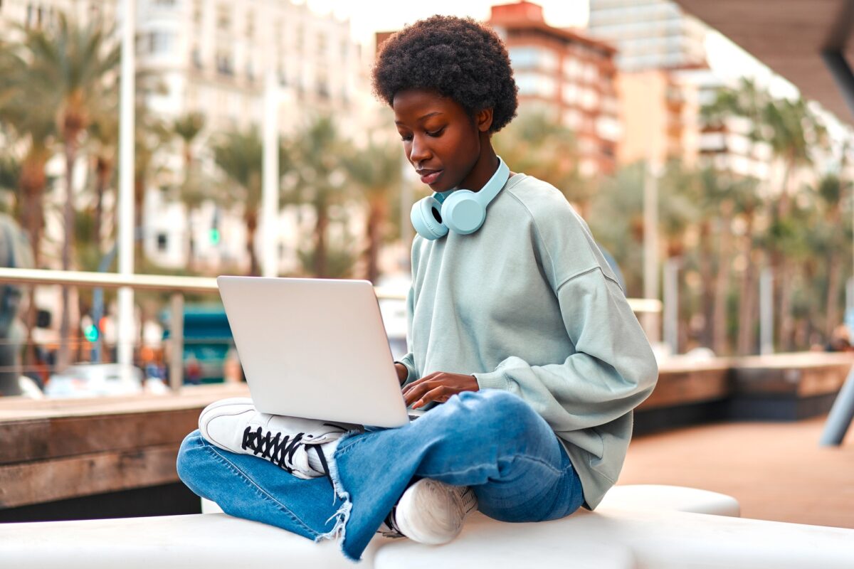 african-american-woman-with-laptop-outdoor